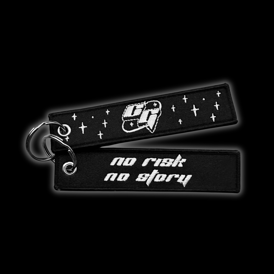 Custom Jet tag keychain with embroidered "No risk, No story", on black background