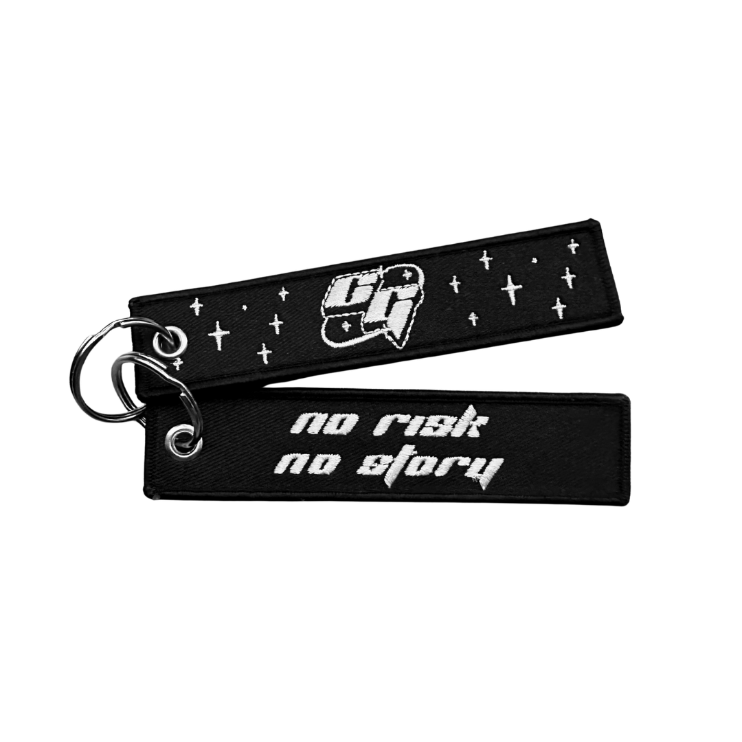 Custom Jet tag keychain with embroidered "No risk, No story", on black background