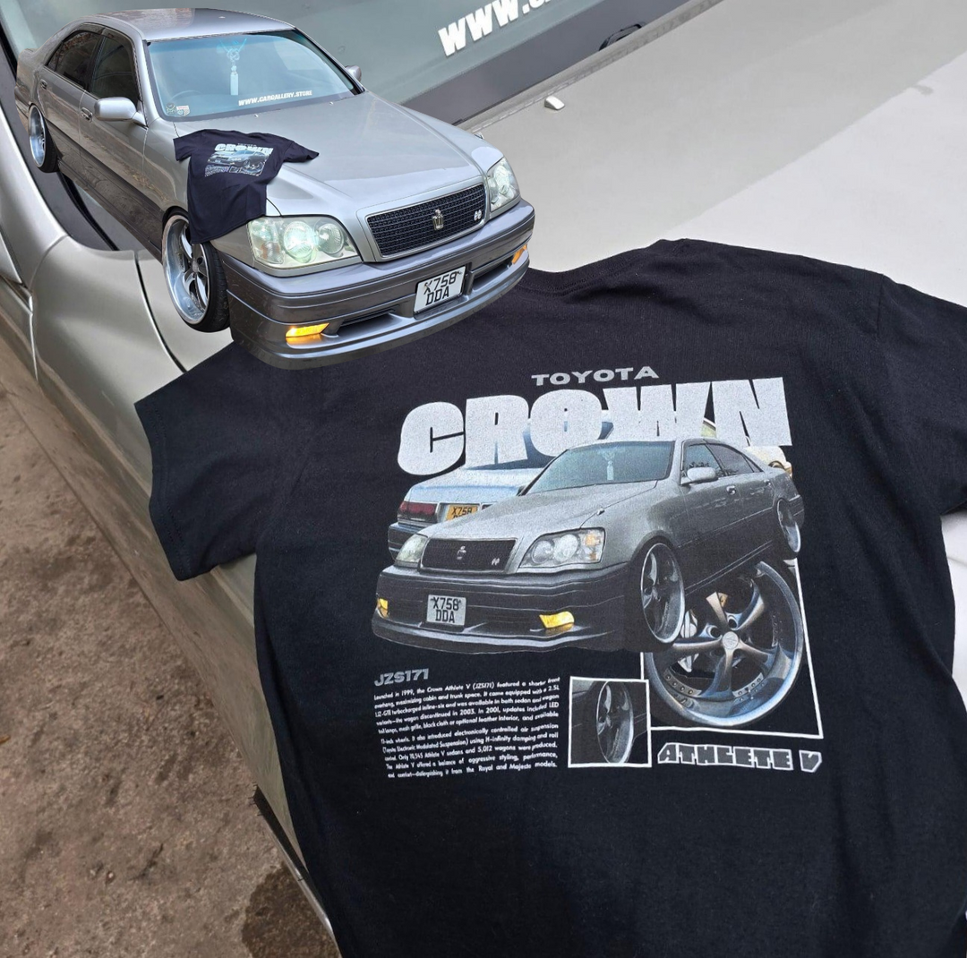 Customer wearing our custom car T-shirt featuring their Toyota Crown Jzs171, photographed next to their car.