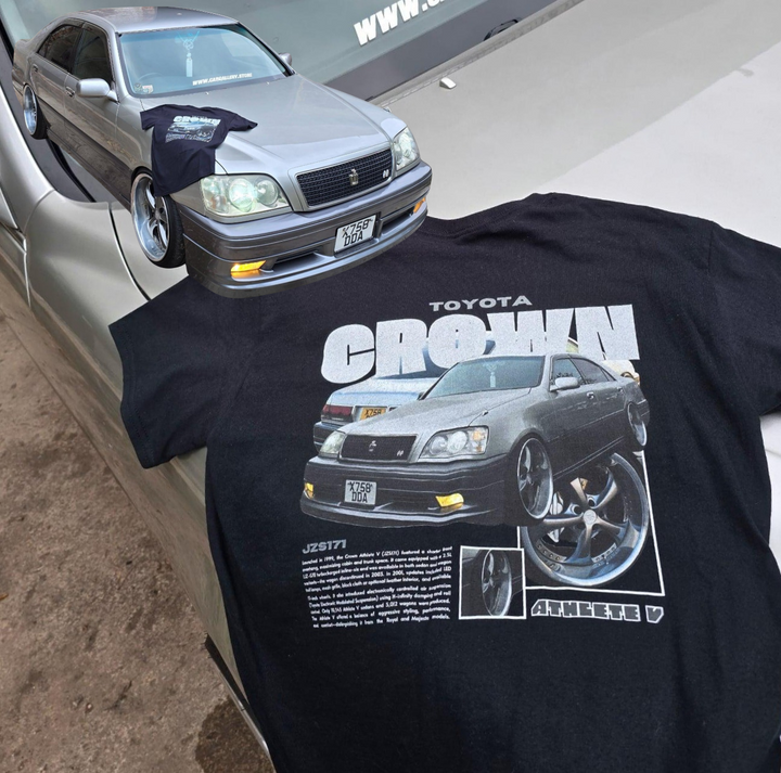 Customer wearing our custom car T-shirt featuring their Toyota Crown Jzs171, photographed next to their car.