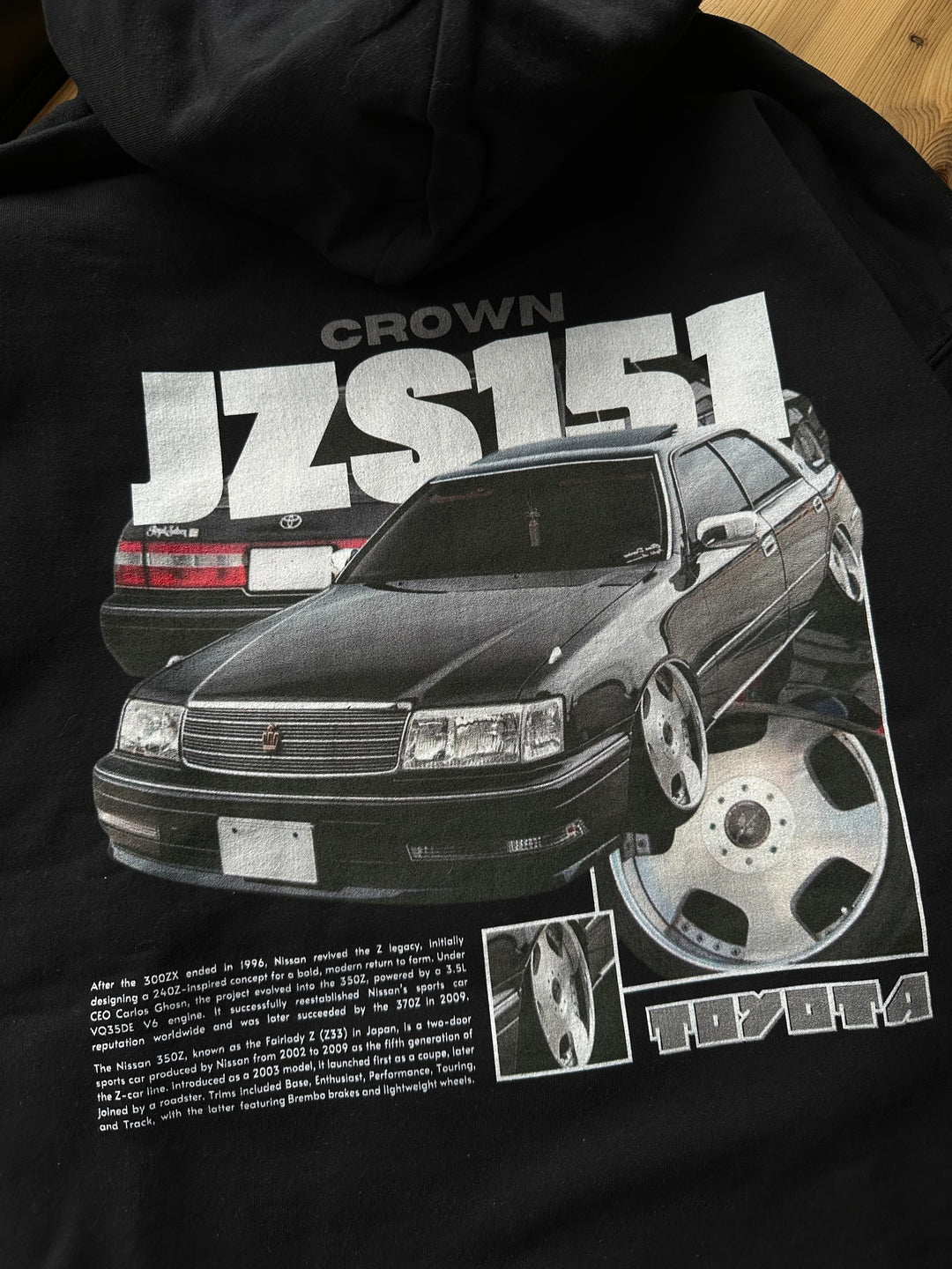 Black hoodie with Toyota Crown JZS151 graphic on the back, picture of the rear, closeup of the graphic